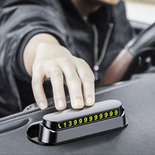 Загрузить изображение в средство просмотра галереи, 2019 New Multifunction Luminous Temporary Parking Card Universal Aromatherapy Board Hidden Mobile Car Phone Holder Card Winder
